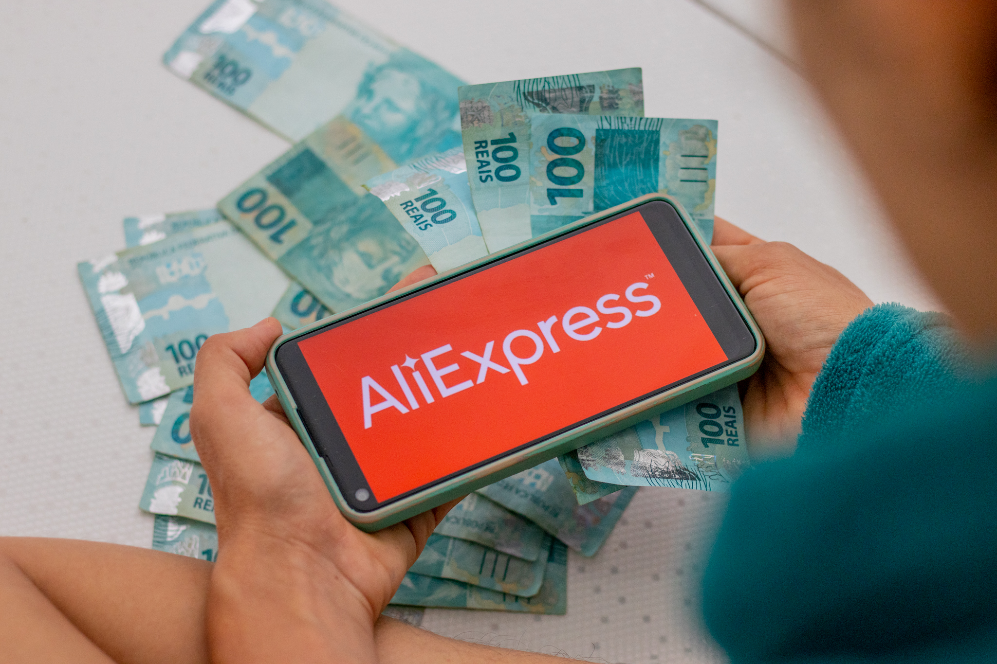 Taxa das blusinhas AliExpress.