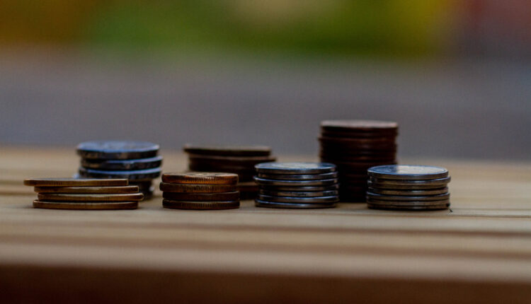 Moedas.