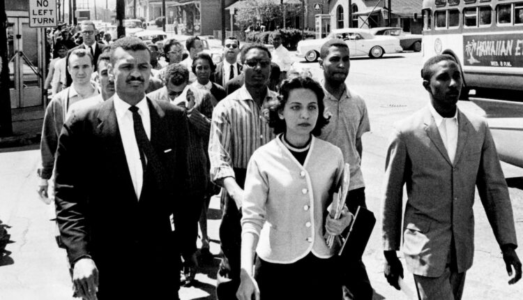 Black leaders march down Jefferson Street in 1960.