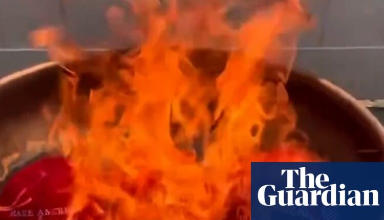 Trump supporters burn Maga hats after he dismisses Epstein files furor as ‘hoax’ | Jeffrey Epstein